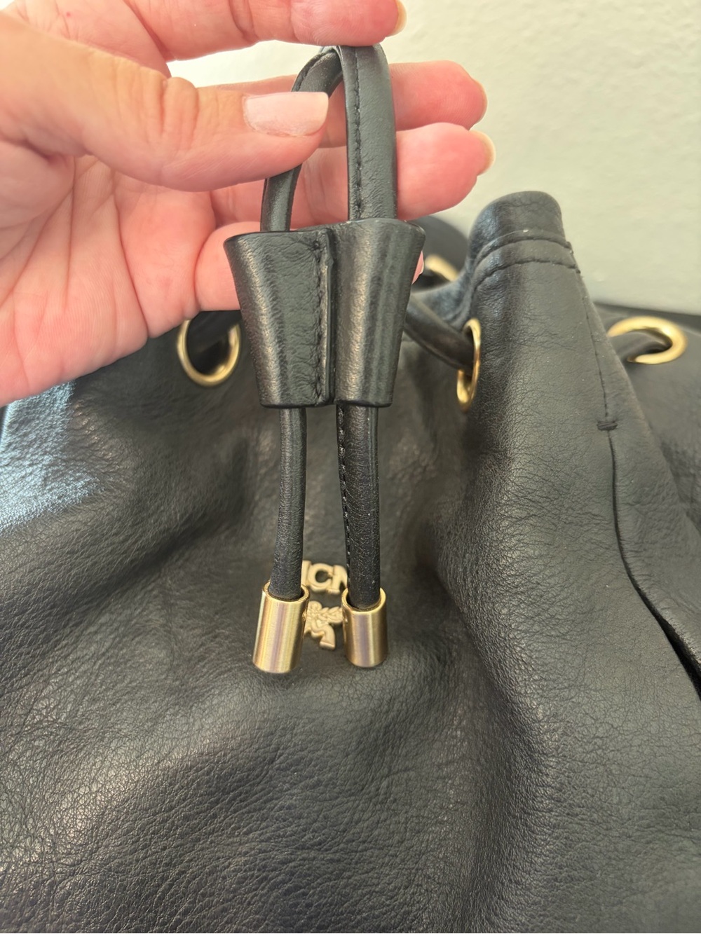 MCM black leather drawstring bucket bag with gold hardware - Picture 9 of 15
